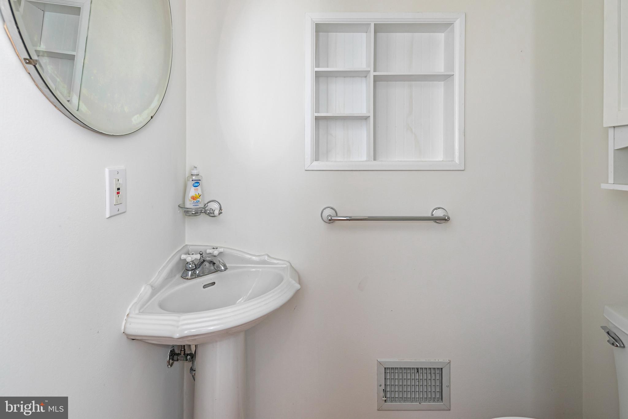 35 Maple Street Princeton, NJ 08542 - Photo 19 of 35 a bathroom with a sink and a mirror