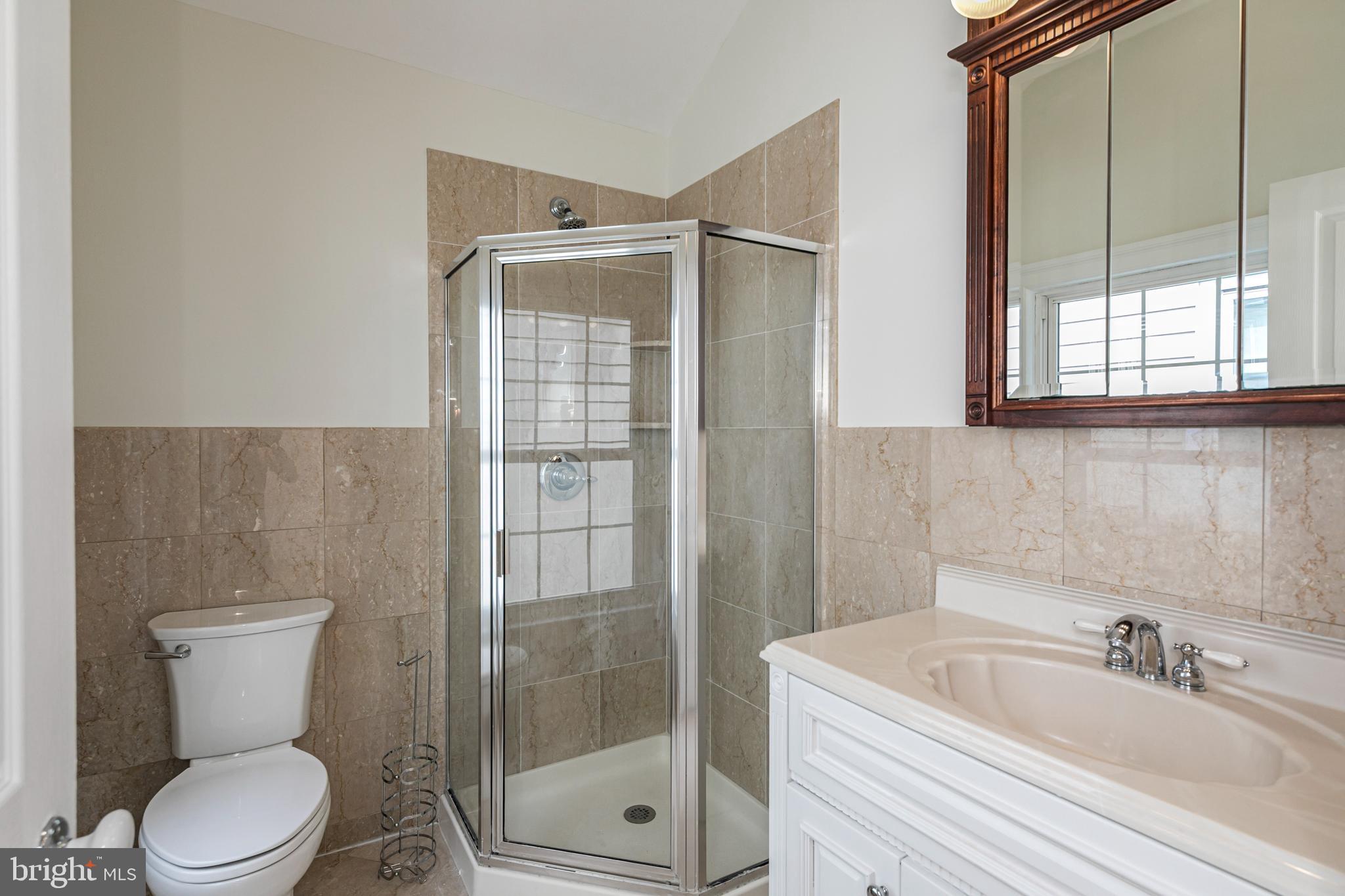 35 Maple Street Princeton, NJ 08542 - Photo 24 of 35 a bathroom with a sink toilet and shower