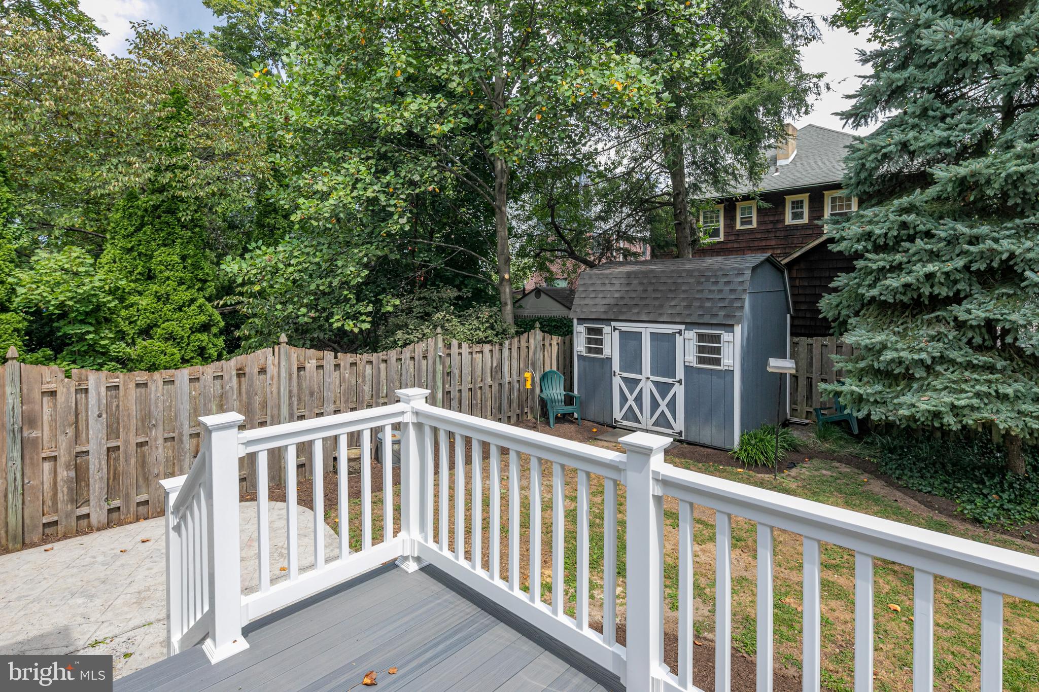35 Maple Street Princeton, NJ 08542 - Photo 35 of 35 a view of a brick house with wooden fence