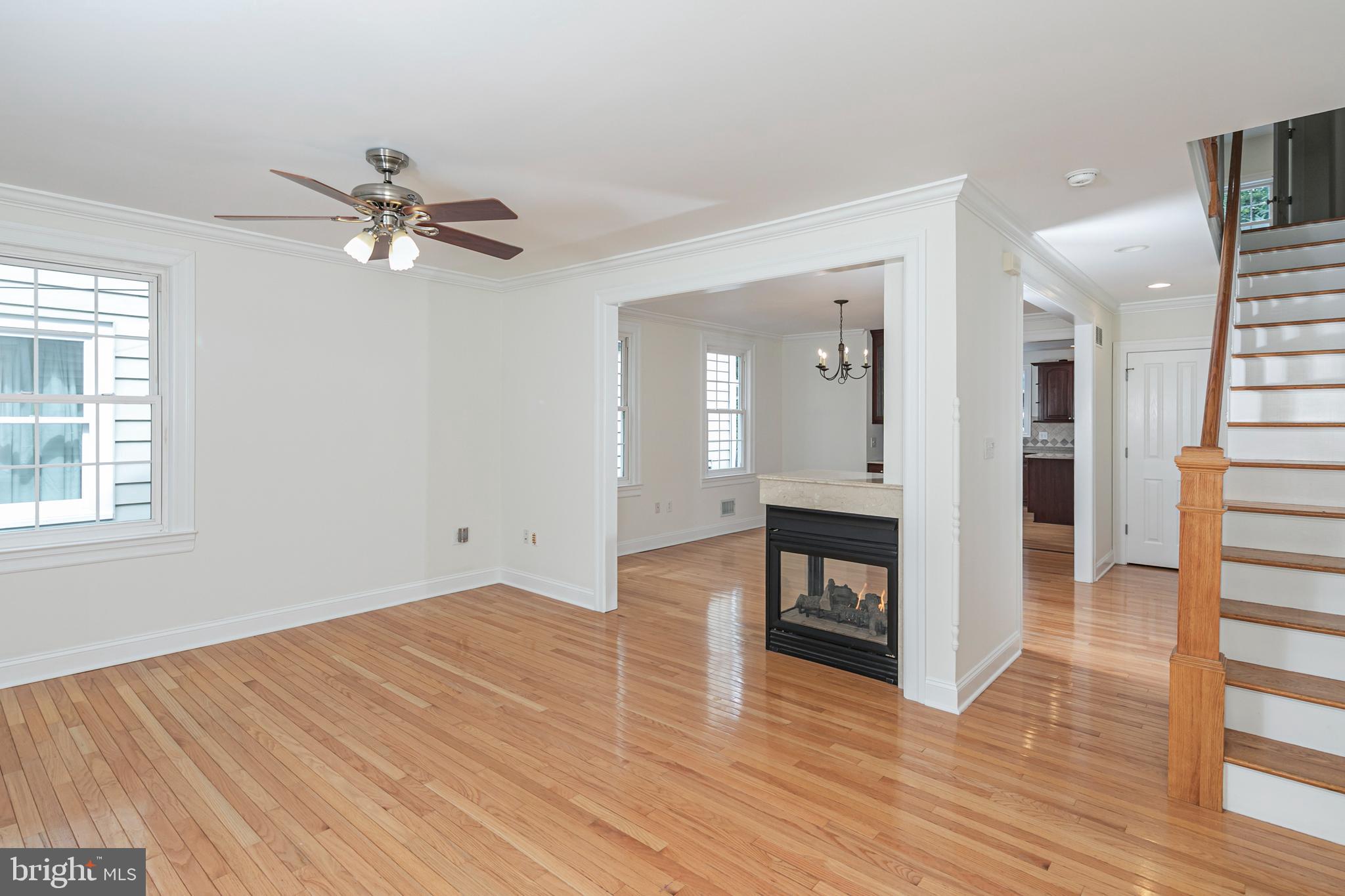 35 Maple Street Princeton, NJ 08542 - Photo 6 of 35 wooden floor in an empty room with a window