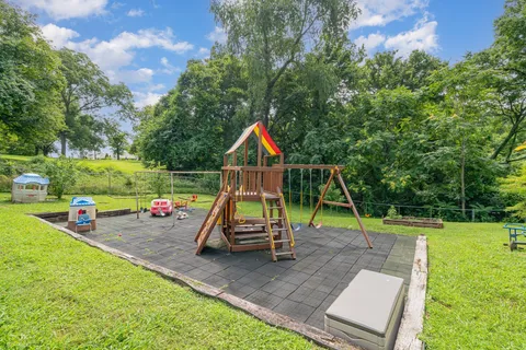 a view of a park with slide