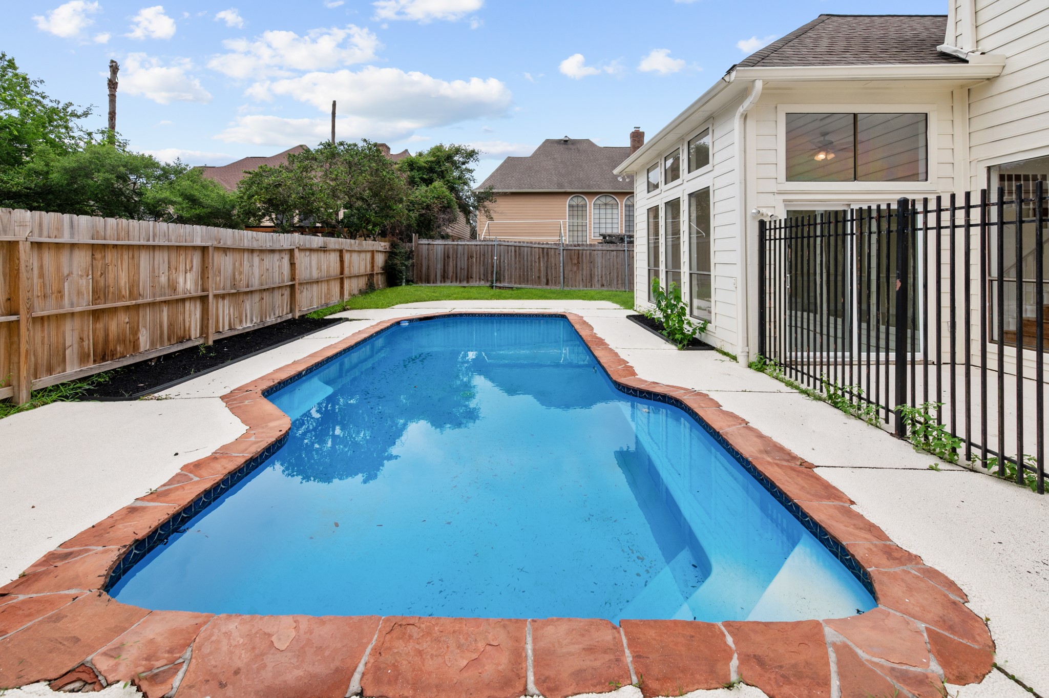 17402 Wilton Park Court Spring, TX 77379 - Photo 19 of 50 a view of swimming pool