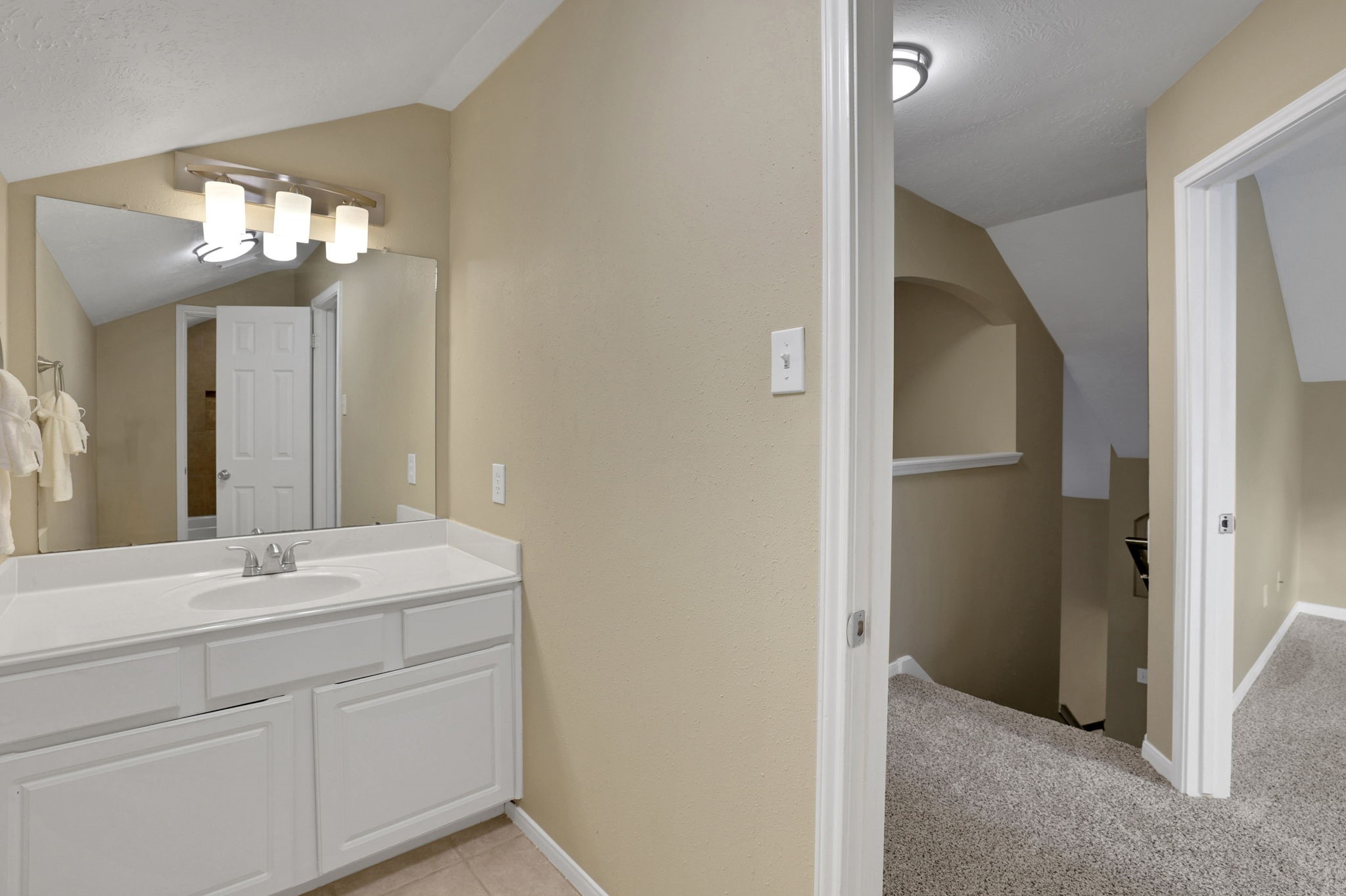 23207 Olive Ridge Court Katy, TX 77494 - Photo 29 of 46 a bathroom with a sink and a mirror