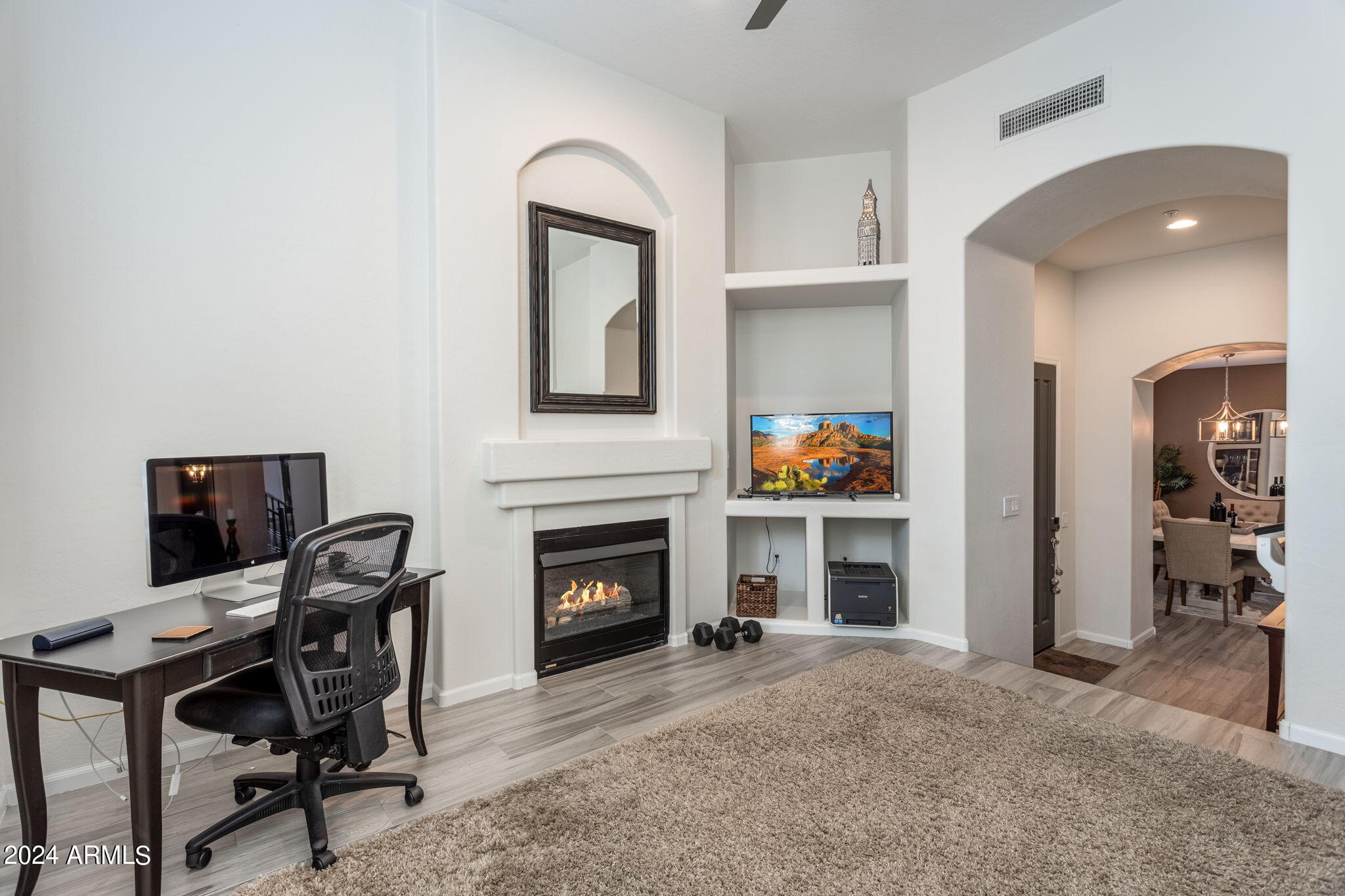 28990 North White Feather Lane, Unit 168 Scottsdale, AZ 85262 - Photo 13 of 36 a view of a livingroom with furniture and a fireplace
