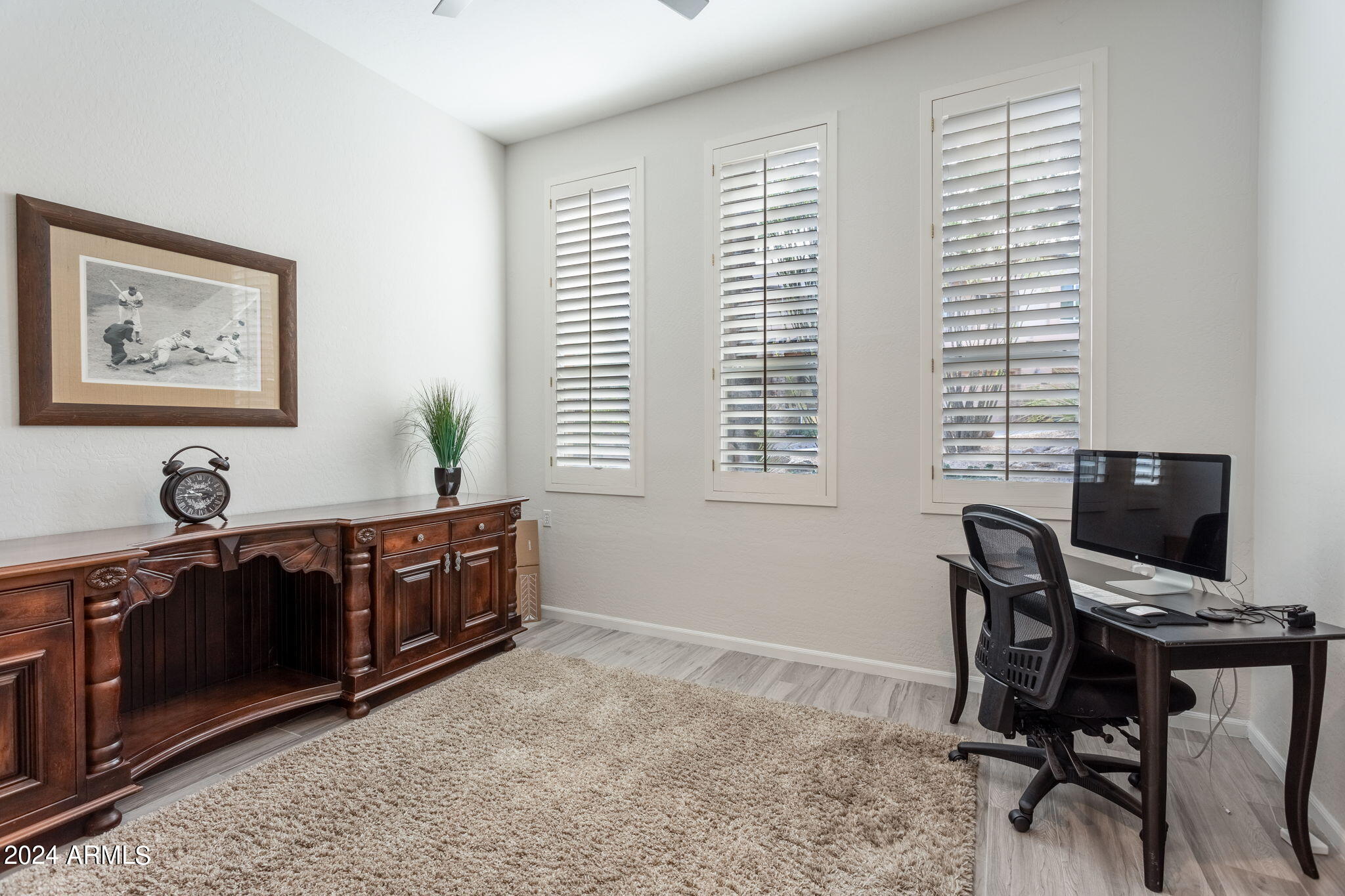 28990 North White Feather Lane, Unit 168 Scottsdale, AZ 85262 - Photo 14 of 36 a view of a workspace with furniture and a window