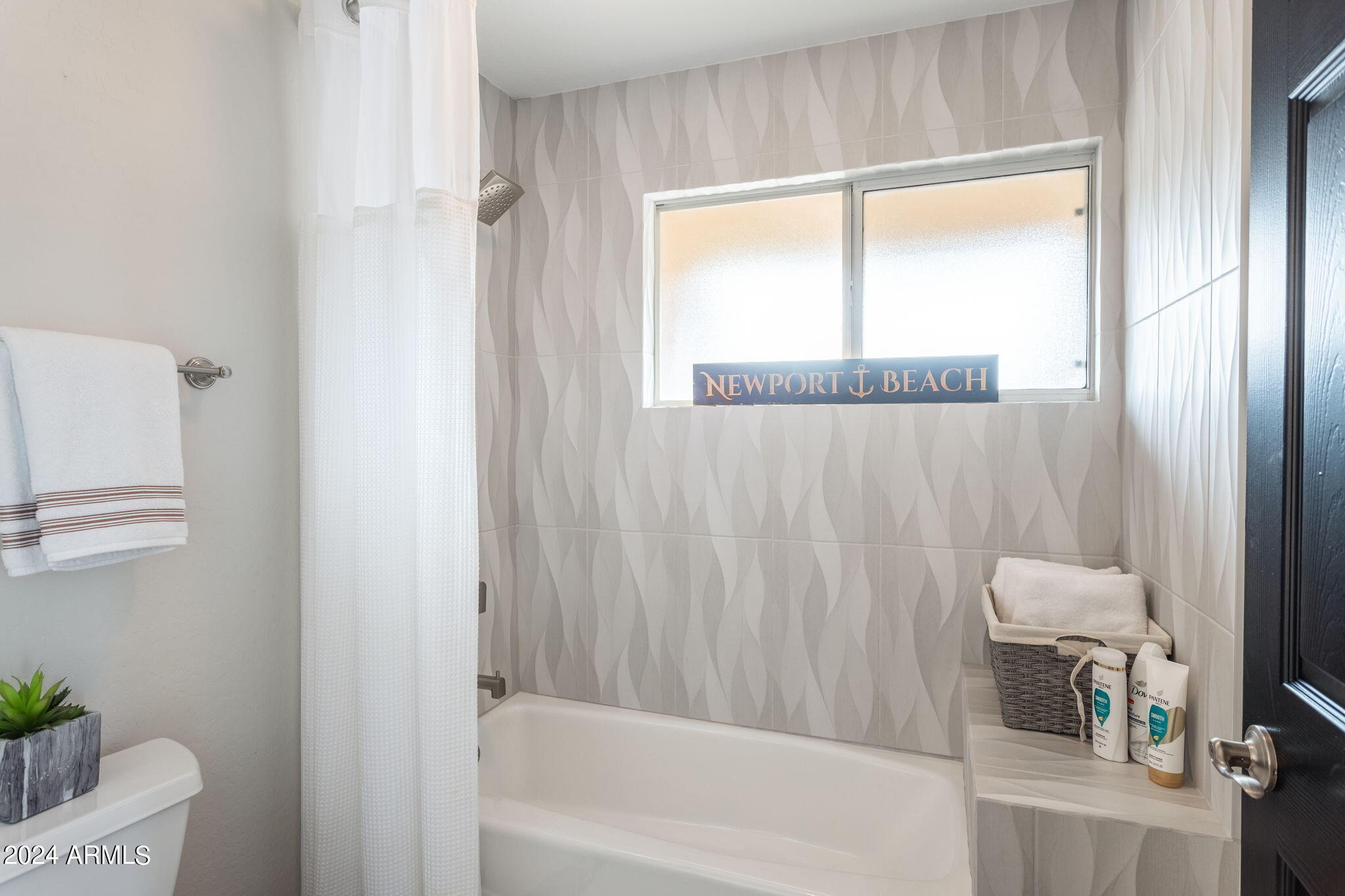 28990 North White Feather Lane, Unit 168 Scottsdale, AZ 85262 - Photo 25 of 36 a bathroom with a bathtub and a shower