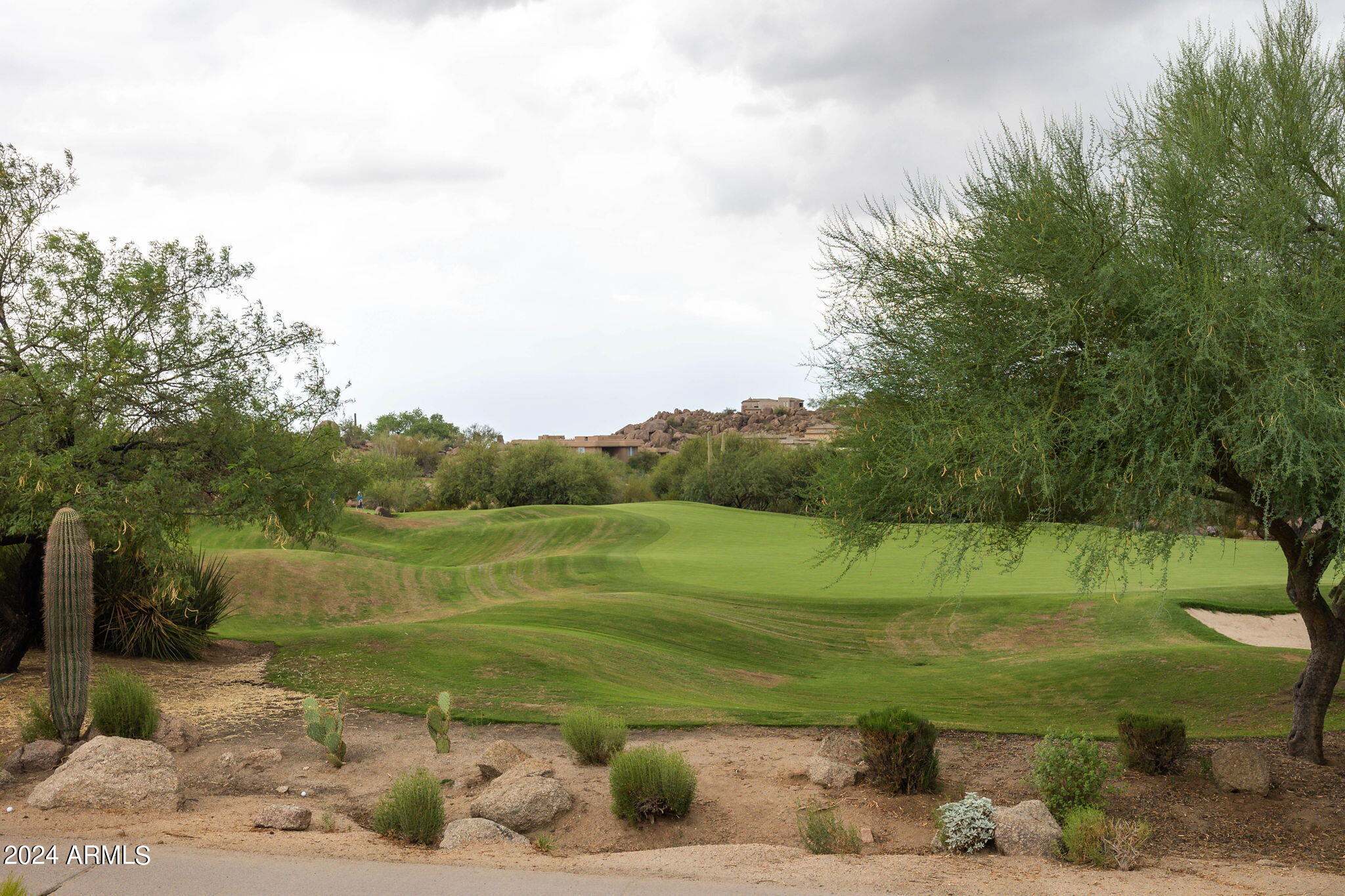 28990 North White Feather Lane, Unit 168 Scottsdale, AZ 85262 - Photo 30 of 36 a view of a lake with a yard