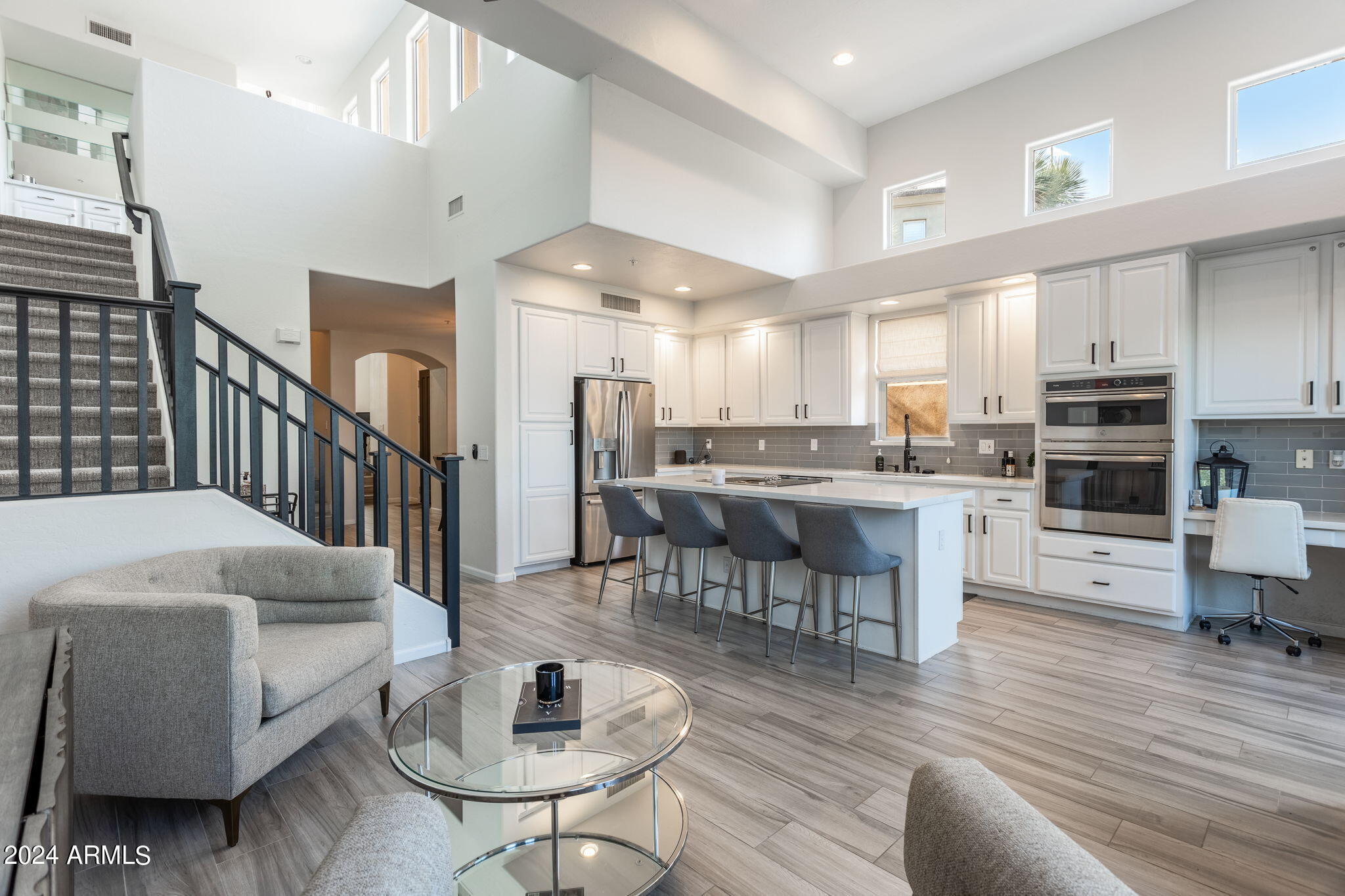 28990 North White Feather Lane, Unit 168 Scottsdale, AZ 85262 - Photo 5 of 36 a living room with stainless steel appliances kitchen island granite countertop furniture and a kitchen view