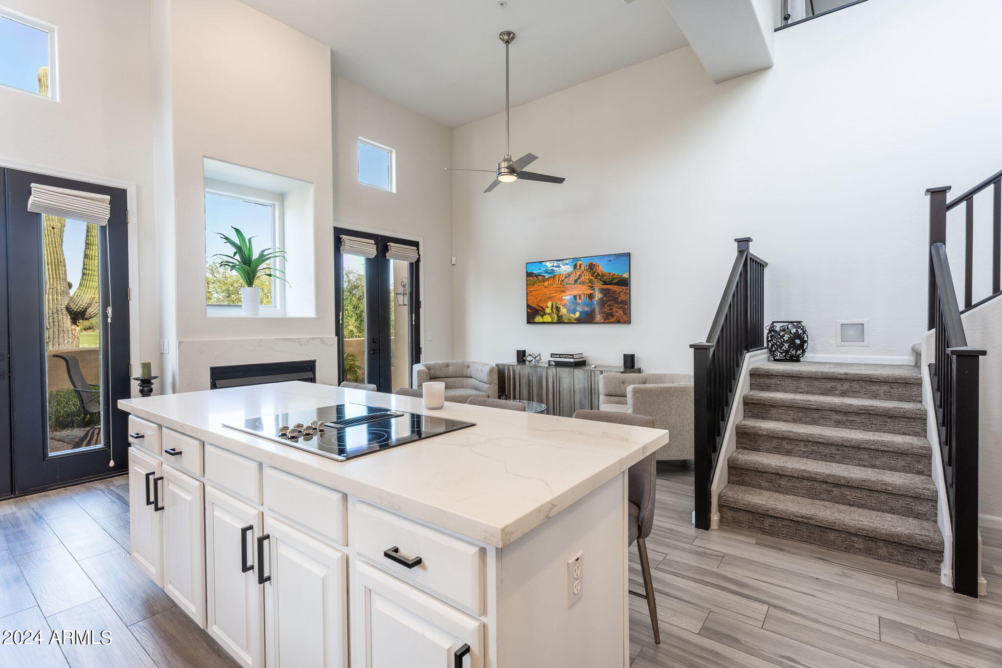 28990 North White Feather Lane, Unit 168 Scottsdale, AZ 85262 - Photo 8 of 36 a kitchen that has a cabinets and a stove