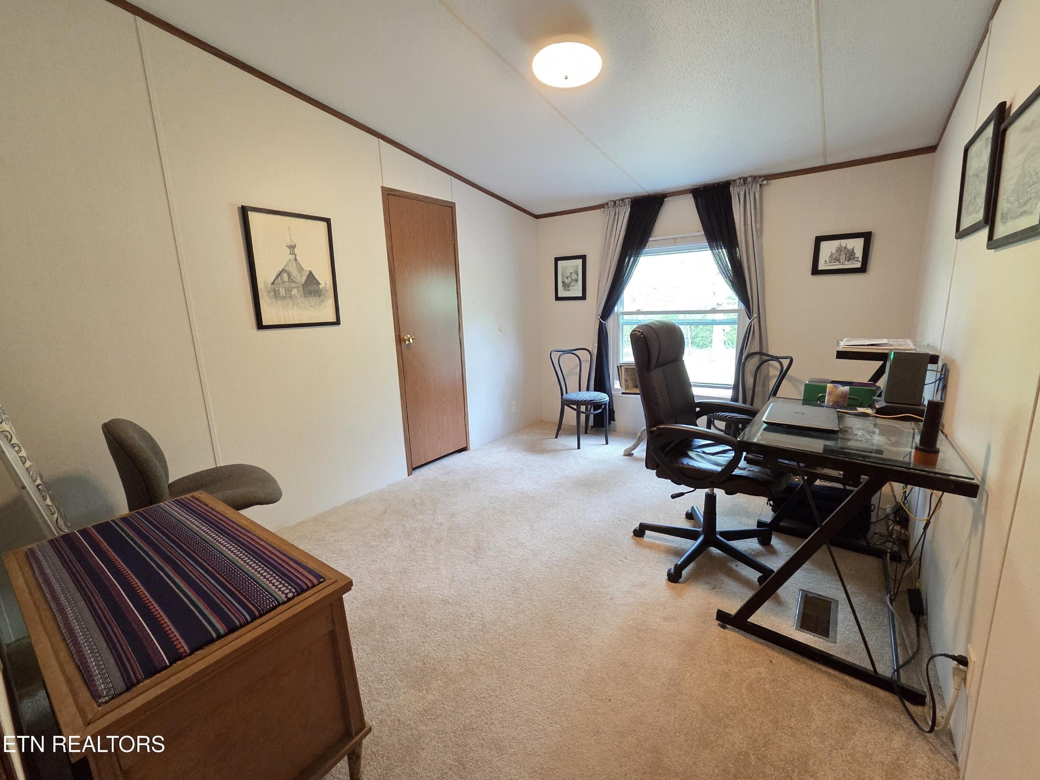 149 Carter Town Road Crossville, TN 38571 - Photo 24 of 30 a work room with furniture and windows