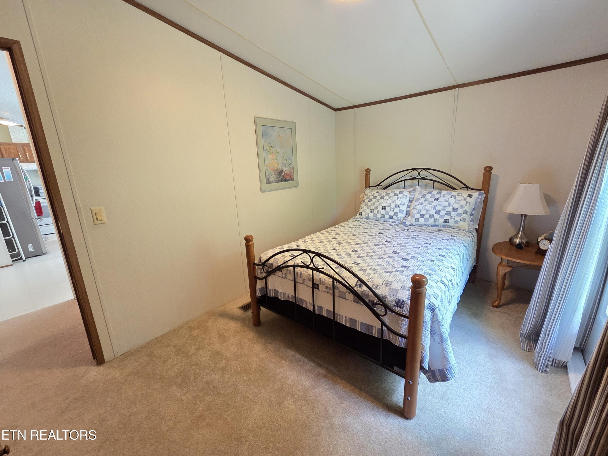 149 Carter Town Road Crossville, TN 38571 - Photo 29 of 30 a bedroom with a bed chair and a window