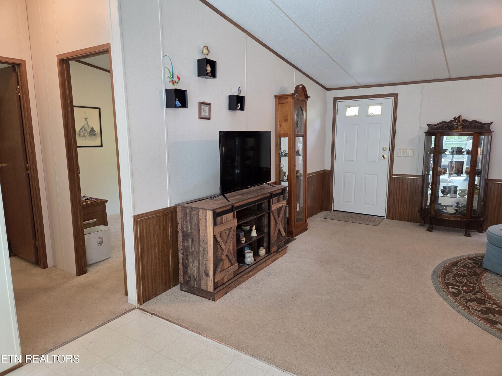 149 Carter Town Road Crossville, TN 38571 - Photo 6 of 30 a living room with furniture and a flat screen tv