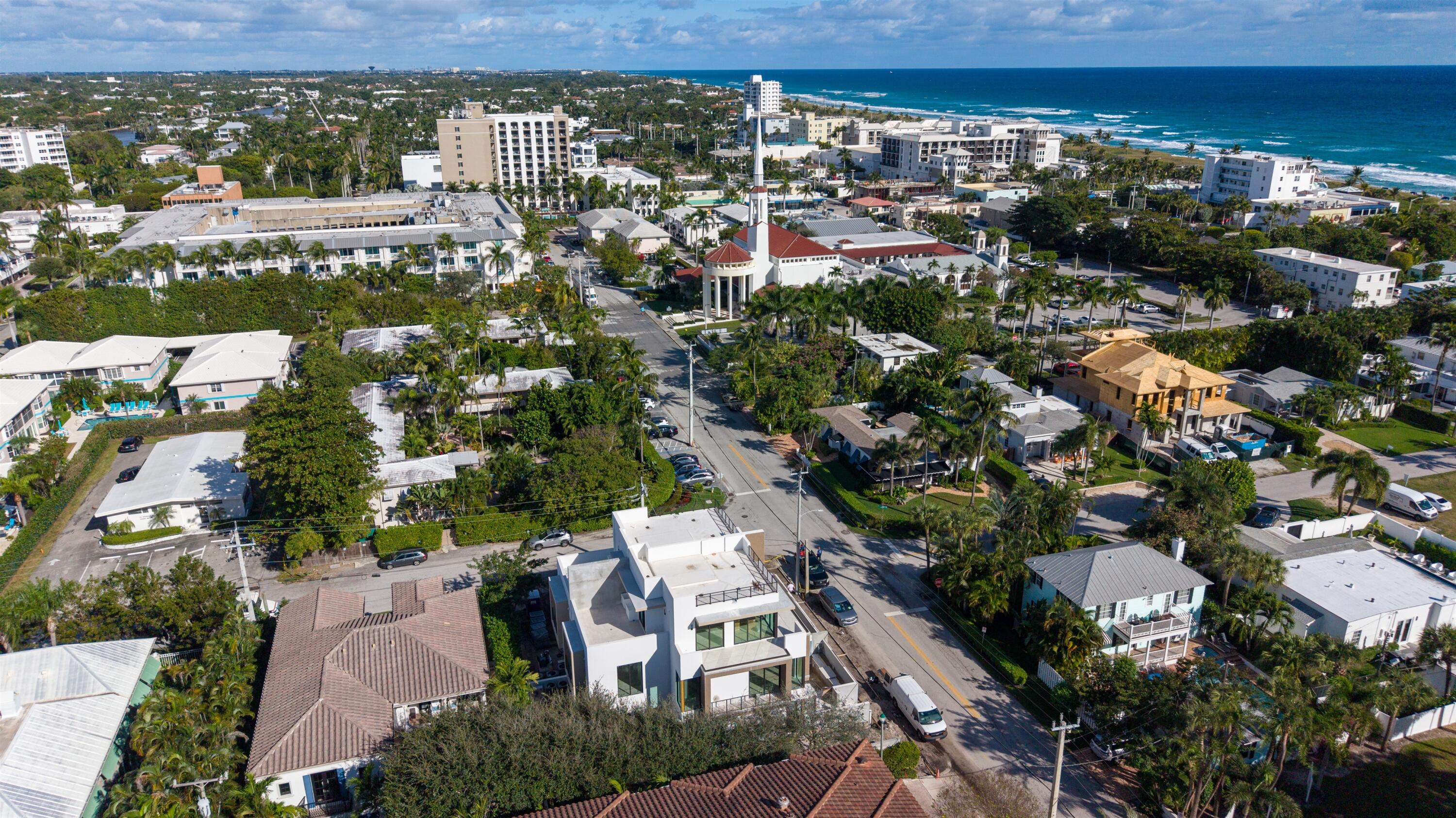100 Gleason Street, Unit 204 Delray Beach, FL 33483 - Photo 5 of 8 an aerial view of residential houses with outdoor space
