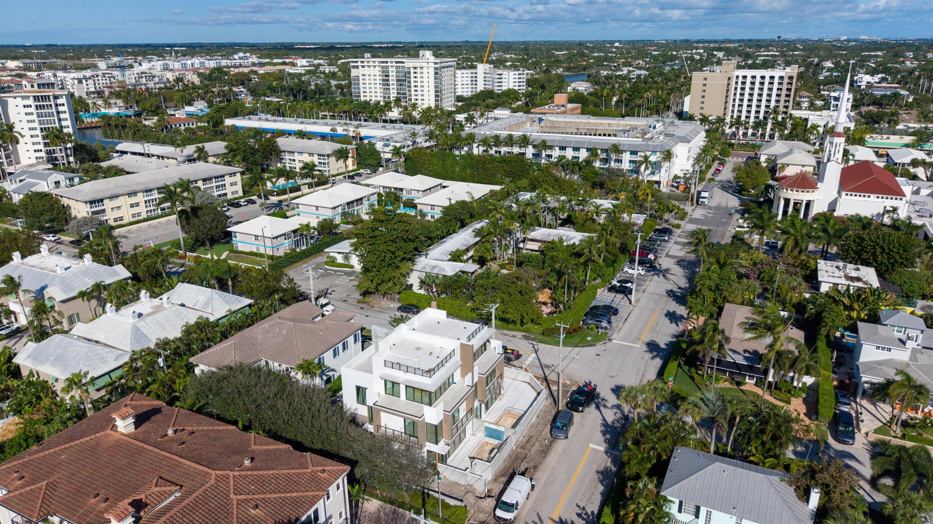 100 Gleason Street, Unit 204 Delray Beach, FL 33483 - Photo 7 of 8 an aerial view of residential houses with outdoor space