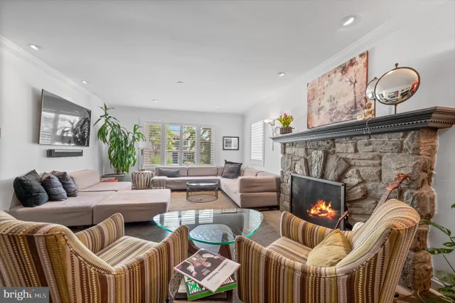 a kitchen with stainless steel appliances granite countertop sink stove and refrigerator