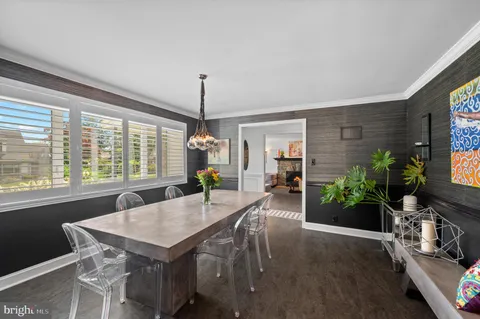 a kitchen with stainless steel appliances granite countertop a refrigerator a sink dishwasher a stove and a refrigerator