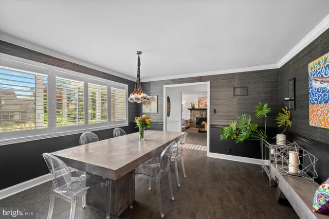 a kitchen with stainless steel appliances granite countertop a refrigerator a sink dishwasher a stove and a refrigerator