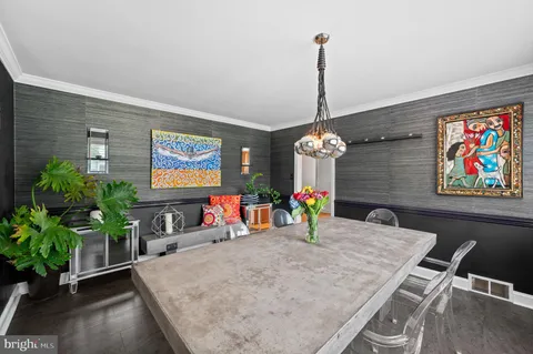 a kitchen with stainless steel appliances granite countertop a sink a window and a counter top space