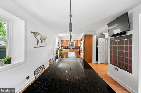 a bathroom with a sink a mirror and a shower