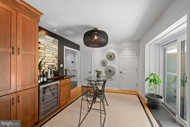 a view of workspace with a window and chair