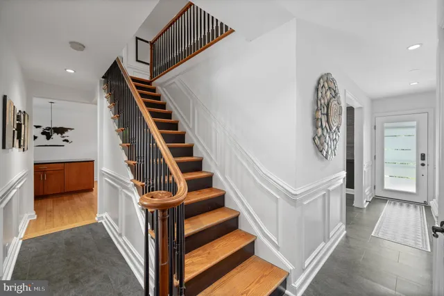 a room with gym equipment and a table