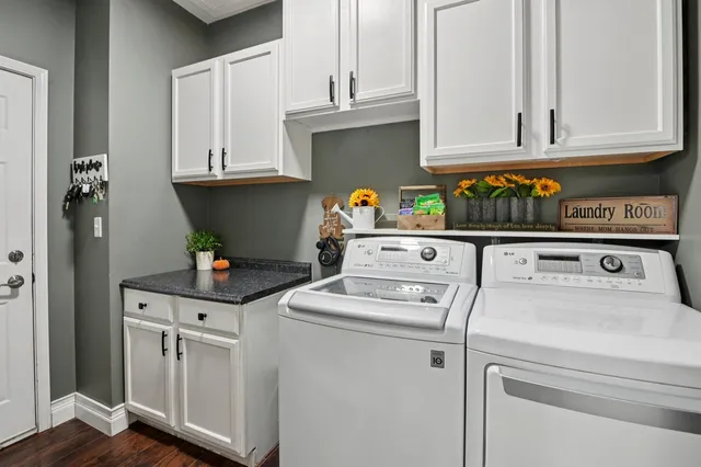a utility room with dryer and washer