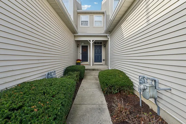 a view of a pathway with a house