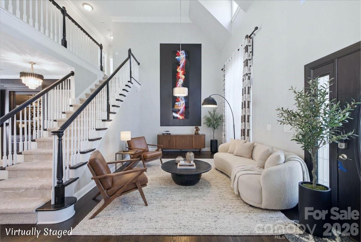 1825 Laveta Road Charlotte, NC 28269 - Photo 6 of 48 a living room with furniture and a potted plant