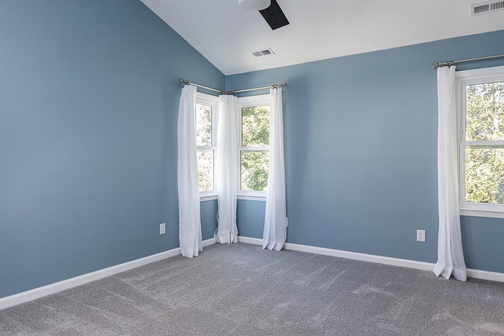 12212 Amoretto Way Raleigh, NC 27613 - Photo 14 of 30 Directly above with the same generous windows, find the master retreat with cathedral ceiling! Master Suite