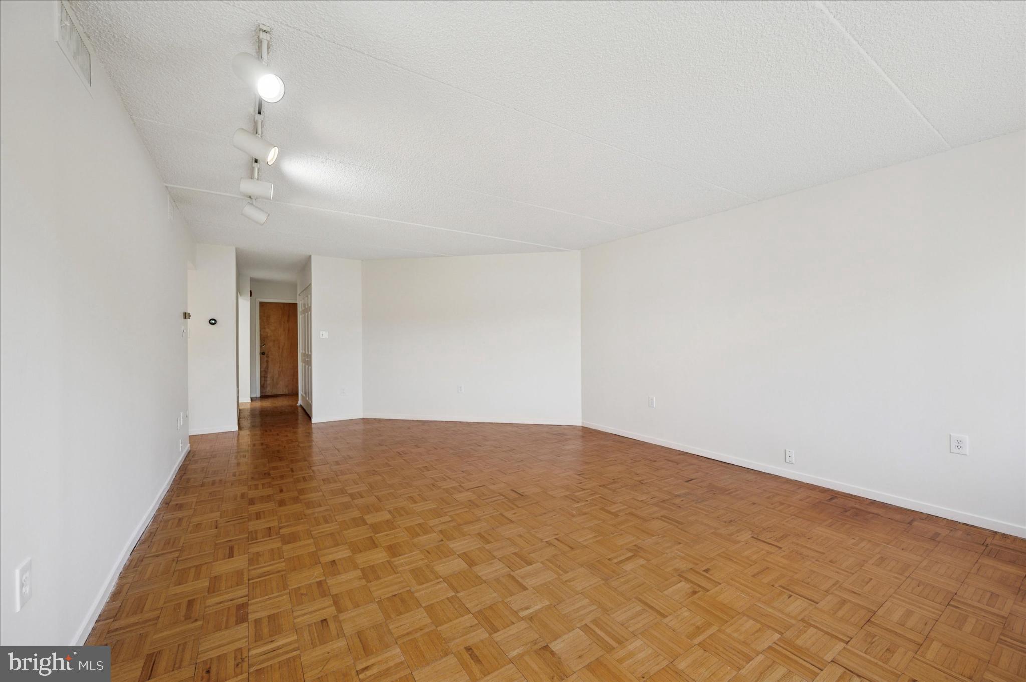19 Rock Hill Road, Unit 7D Bala Cynwyd, PA 19004 - Photo 11 of 37 wooden floor in an empty room