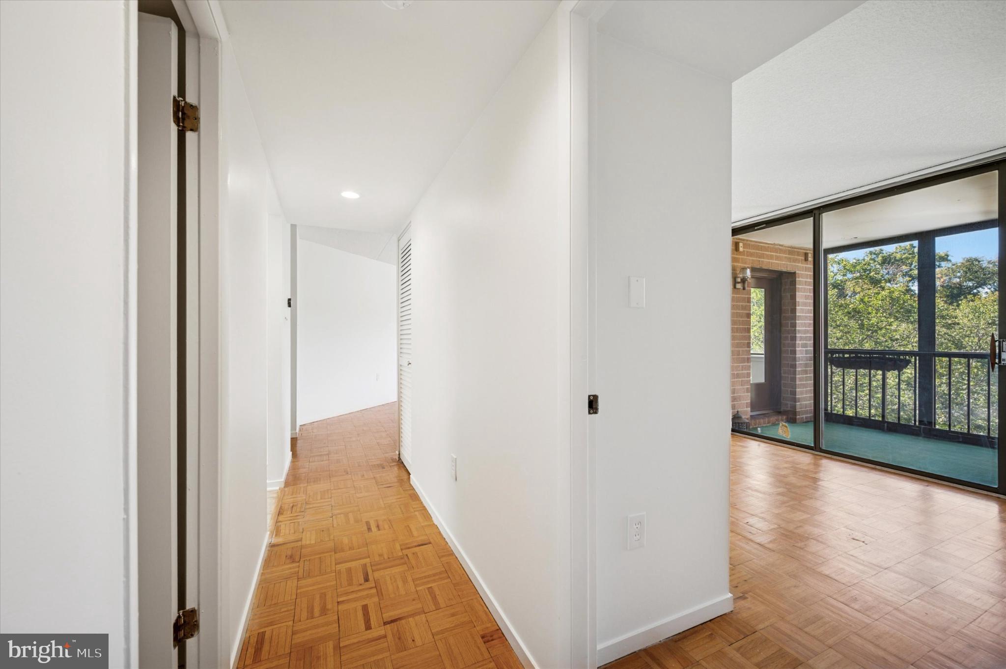 19 Rock Hill Road, Unit 7D Bala Cynwyd, PA 19004 - Photo 21 of 37 a view of a hallway with wooden floor and windows