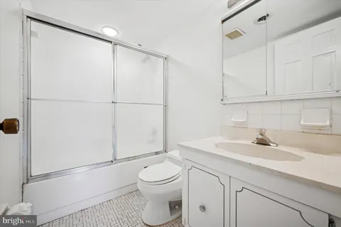 an empty room with a bathroom