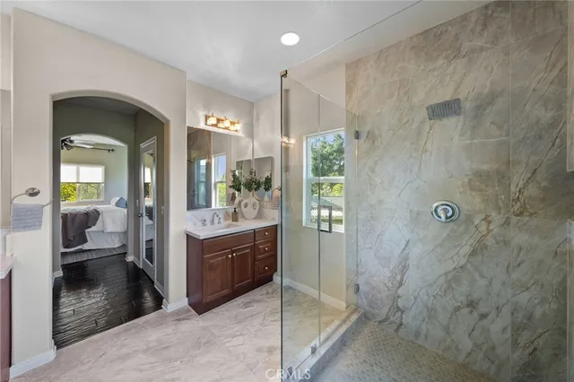 a building outdoor space with patio furniture and potted plants