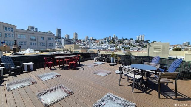 a view of houses with a street