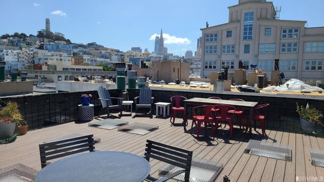 a view of a chairs and table on the terrace