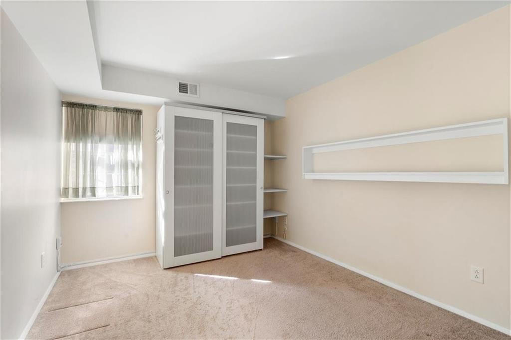 555 Sloop Road, Unit 24 Pittsburgh, PA 15237 - Photo 12 of 34 an empty room with a empty shelves