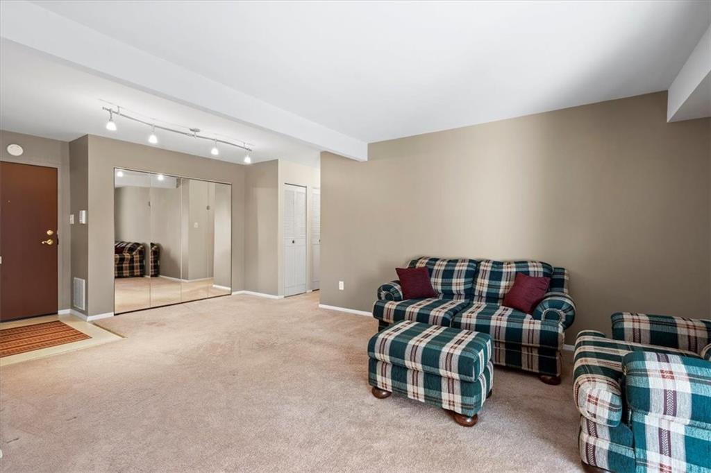 555 Sloop Road, Unit 24 Pittsburgh, PA 15237 - Photo 6 of 34 a bedroom with furniture and a mirror