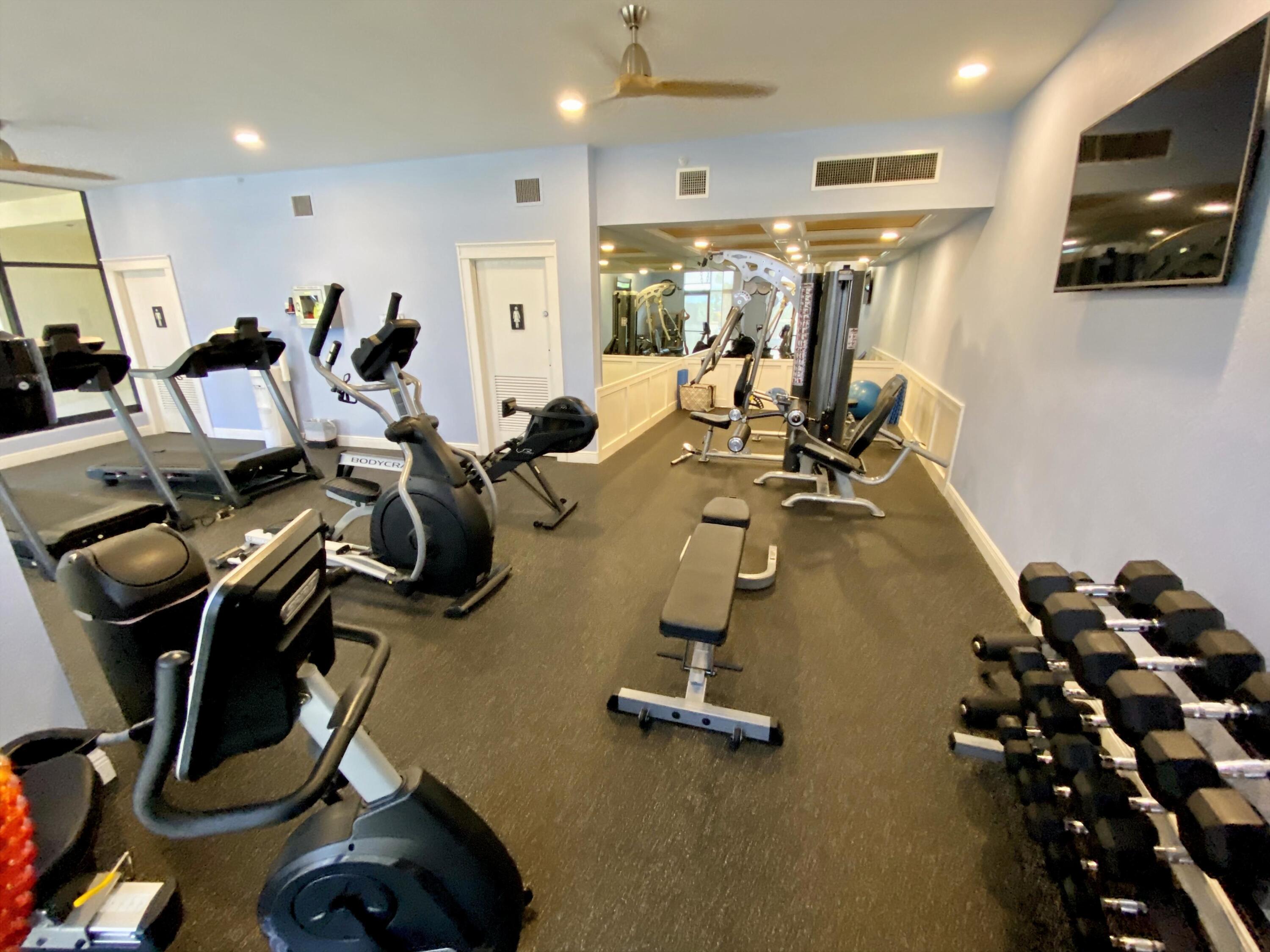 400 Ocean Trail Way, Unit 504 Jupiter, FL 33477 - Photo 18 of 27 a view of a room with gym equipment