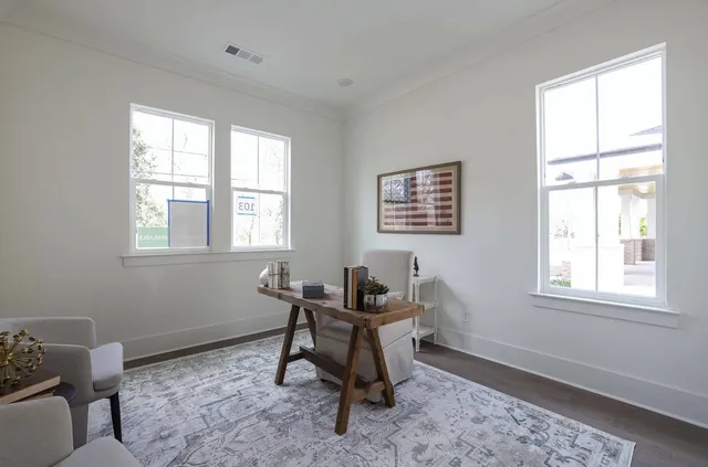 a workspace with furniture and a window