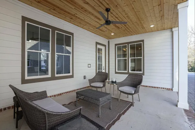 a outdoor living space with furniture and a window