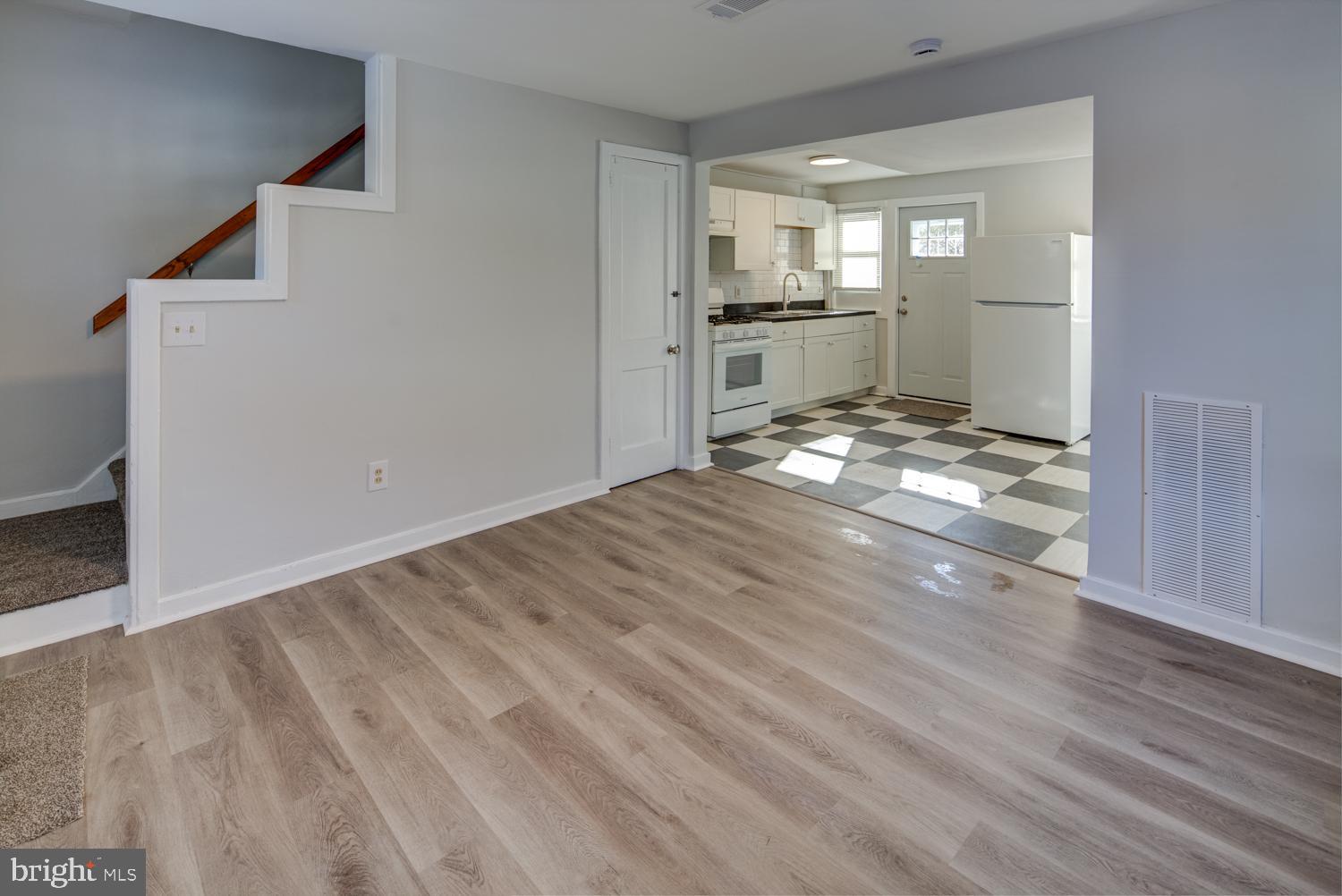 36 Thompson Circle Newark, DE 19711 - Photo 9 of 22 a view of a kitchen cabinets and wooden floor