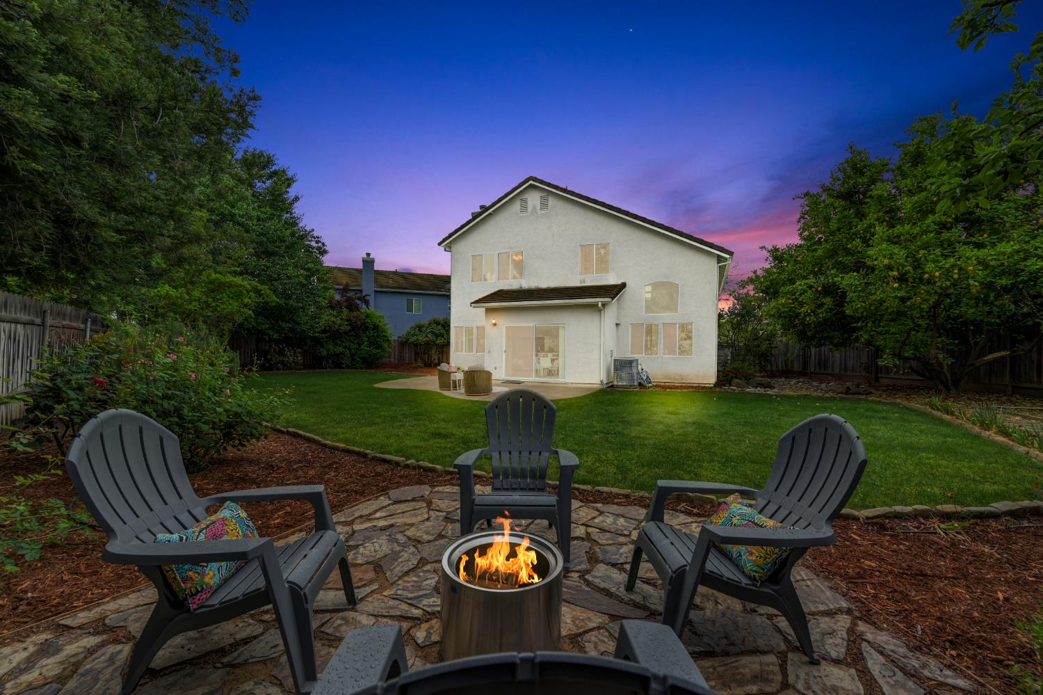 9177 Rizes Way Elk Grove, CA 95758 - Photo 80 of 96 Fire pit fire and Sky is AI generated