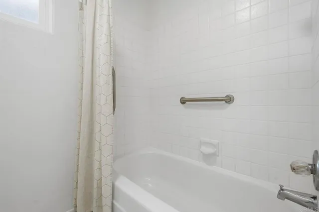 a bathroom with a bathtub