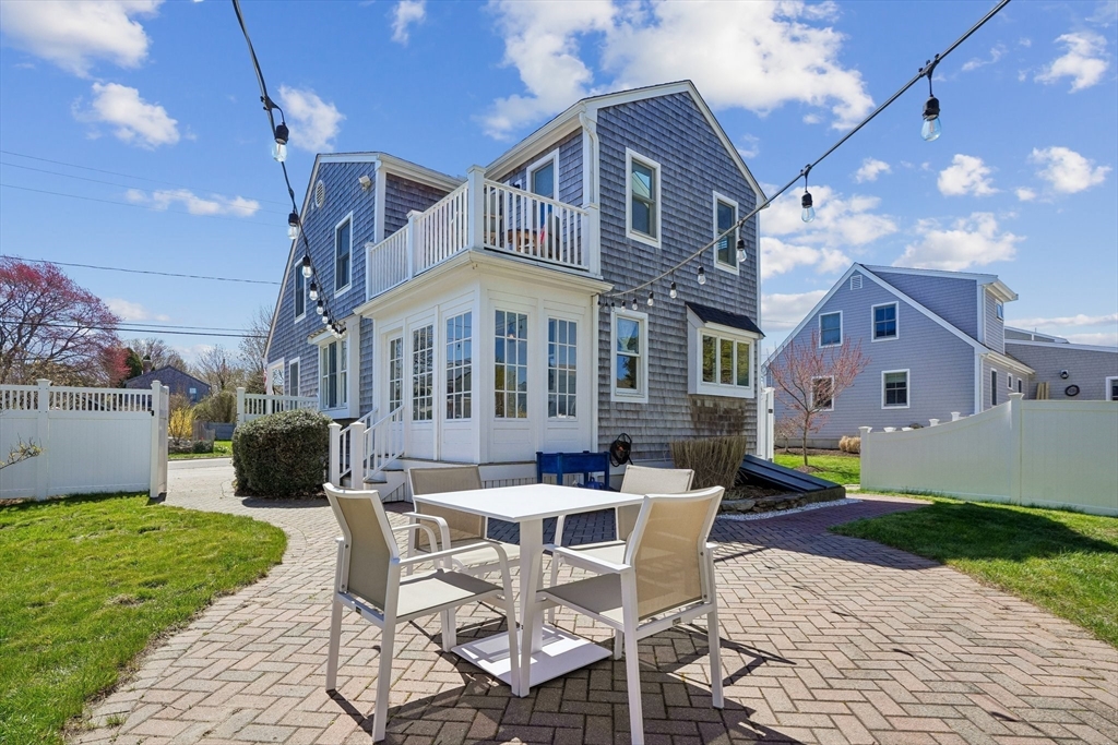 12 Hawley Road Scituate, MA 02066 - Photo 22 of 24 a view of a house with backyard and sitting area
