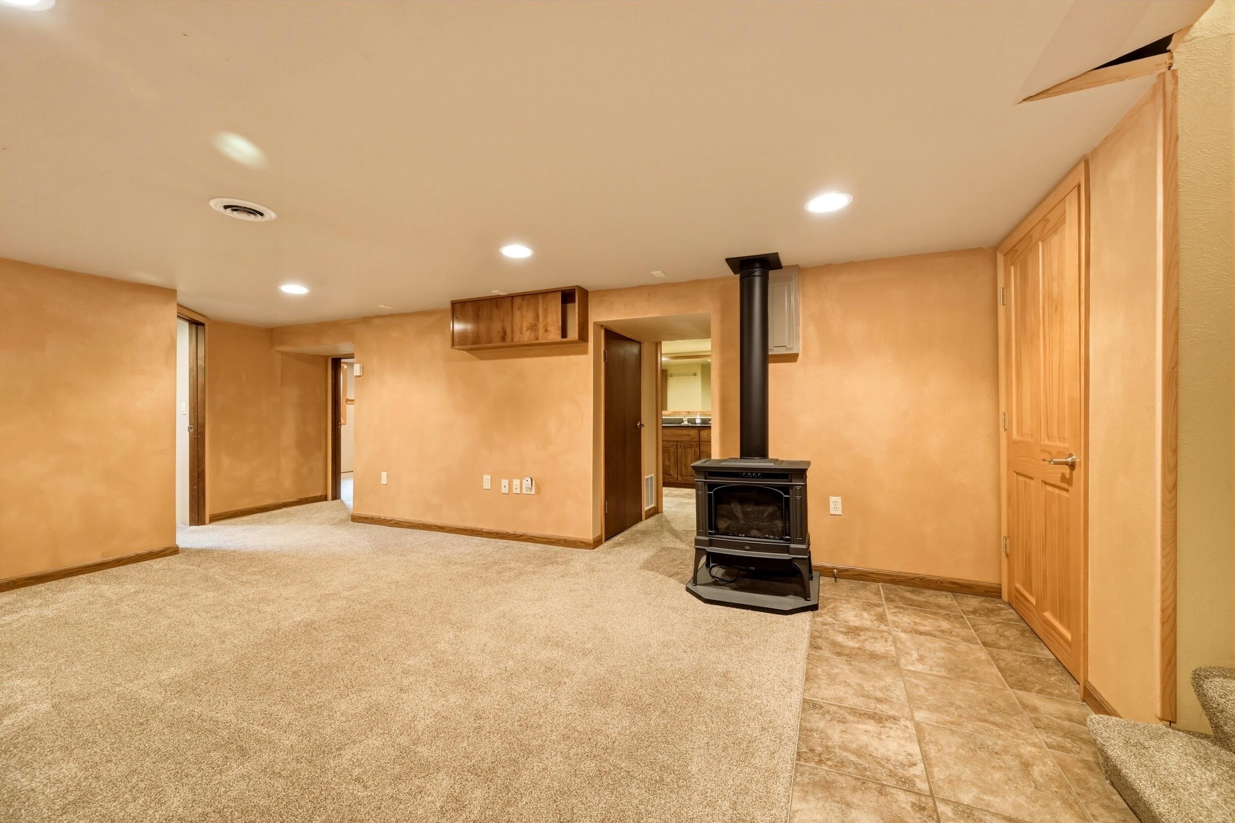 157 Upper Prairie Dog Road Banner, WY 82832 - Photo 49 of 71 150 Family room basement