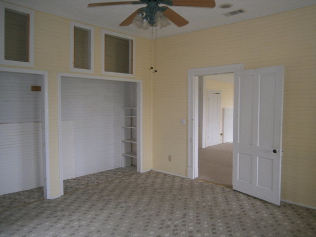 5091 Pine Level Road Ideal, GA 31041 - Photo 11 of 13 a view of an empty room with a ceiling fan