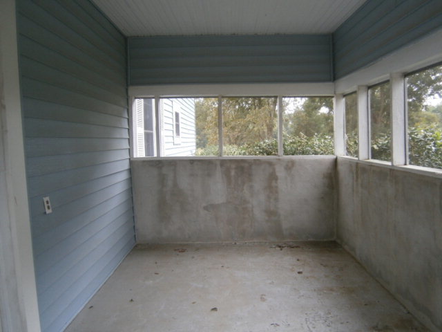 5091 Pine Level Road Ideal, GA 31041 - Photo 5 of 13 an empty room with a window