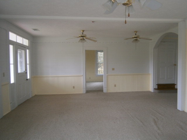 5091 Pine Level Road Ideal, GA 31041 - Photo 7 of 13 wooden floor and a ceiling fan in a room