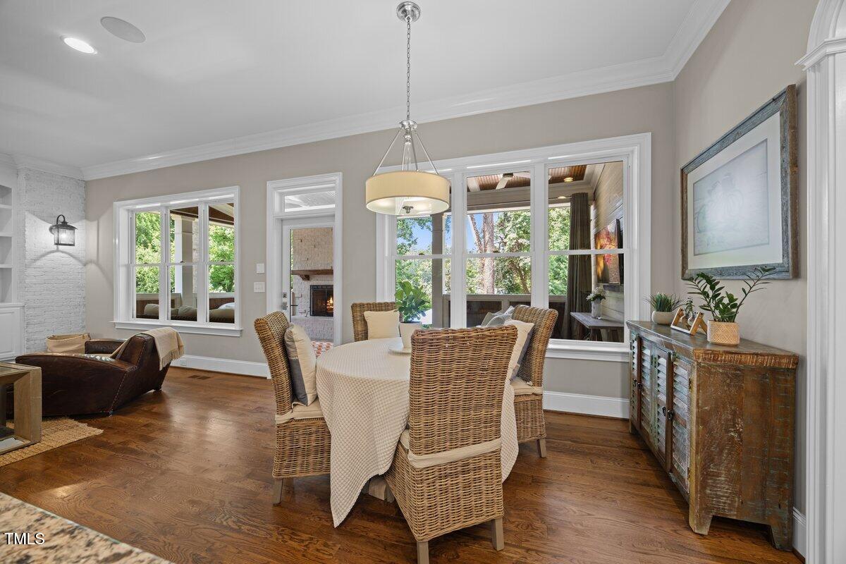 3034 Lewis Farm Road Raleigh, NC 27607 - Photo 19 of 60 a view of a dining room with furniture window and outside view