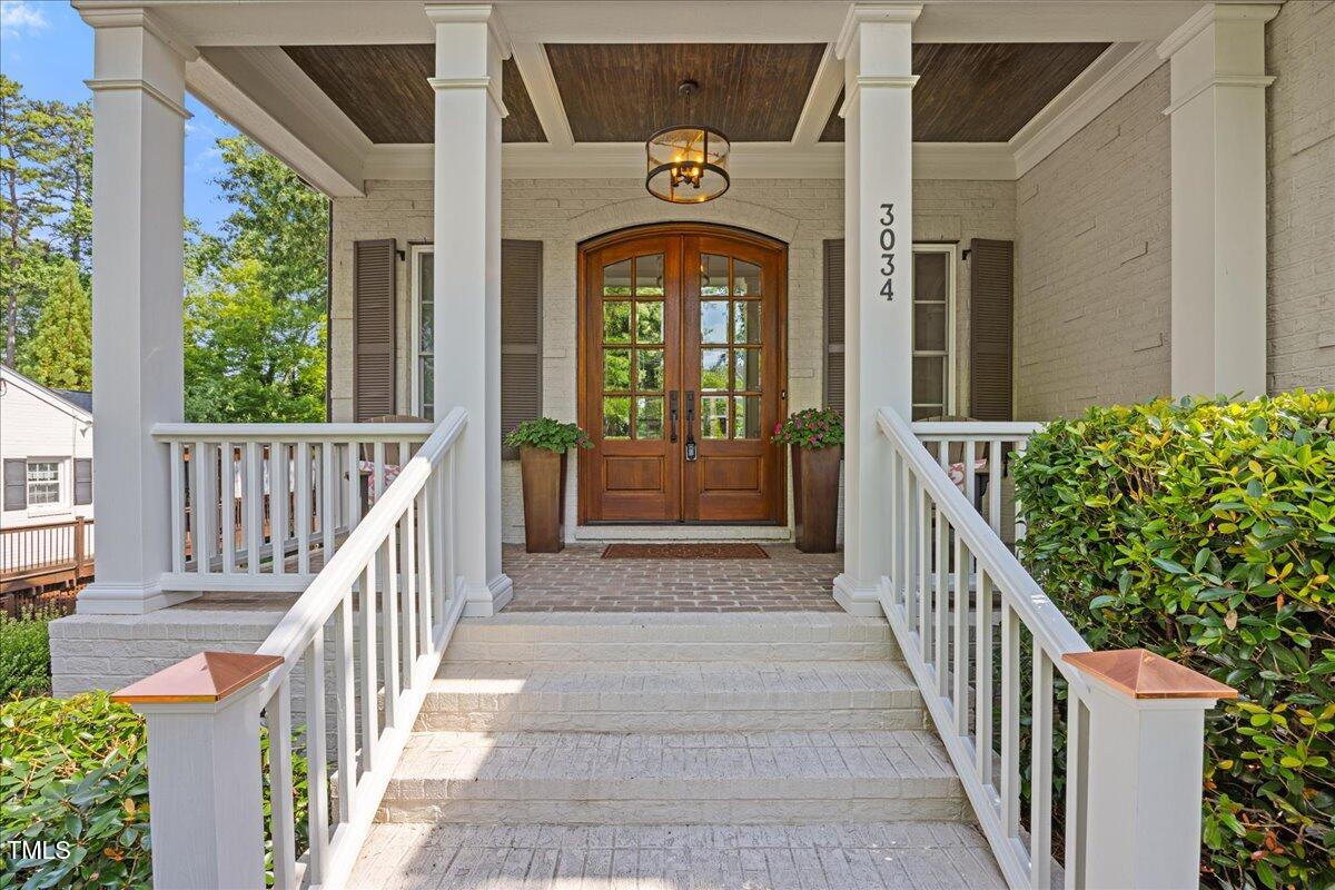 3034 Lewis Farm Road Raleigh, NC 27607 - Photo 7 of 60 a view of a garden from a balcony